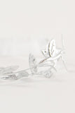 Eve Legtyes in White and Silver