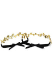 Eve Legtyes in Black and Gold