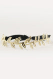 Eve Legtyes in Black and Gold