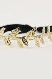 Eve Legtyes in Black and Gold